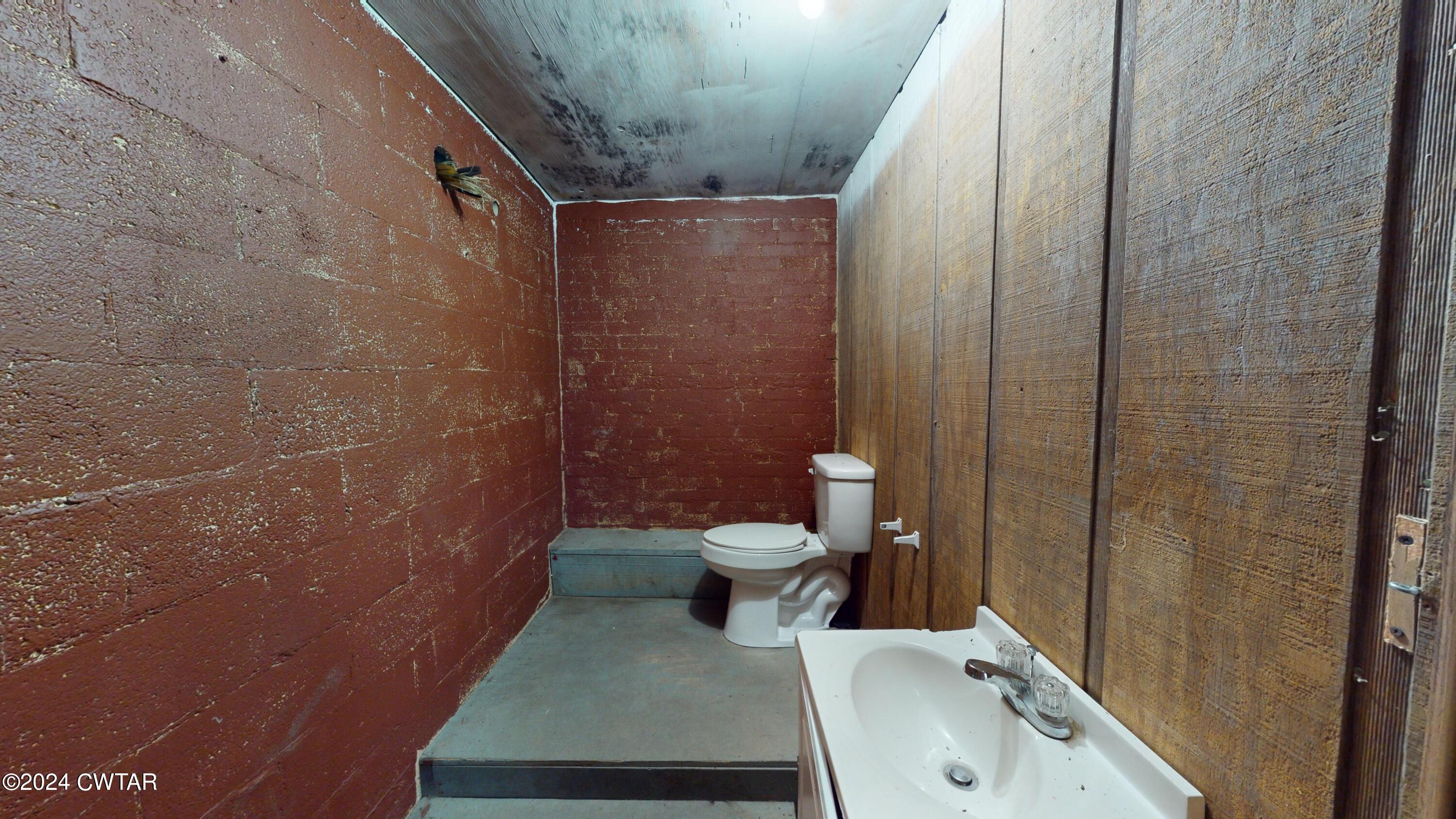 13529 Highway 19 W Ripley Tn 38063 West Ripley, TN 38063 - Photo 10 of 26 a bathroom with a sink toilet and shower