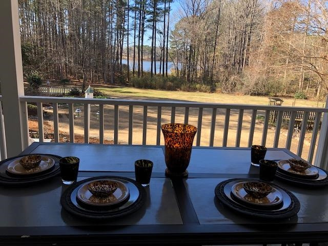6133 View Water Drive Raleigh, NC 27606 - Photo 10 of 43 Or move to the covered porch - to dine alfresco.