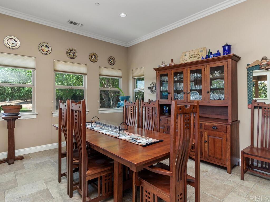 1845 Acacia Lane Fallbrook, CA 92028 - Photo 14 of 54 a view of a dining room with furniture window and outside view