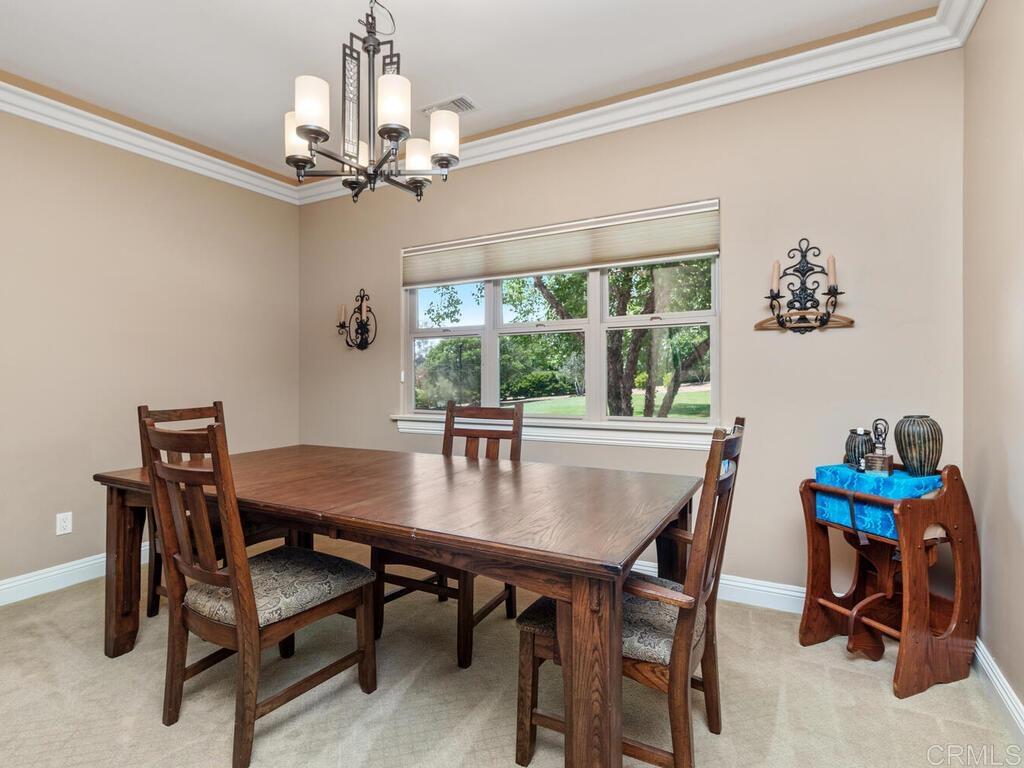 1845 Acacia Lane Fallbrook, CA 92028 - Photo 19 of 54 a view of a dining room with furniture window and outside view