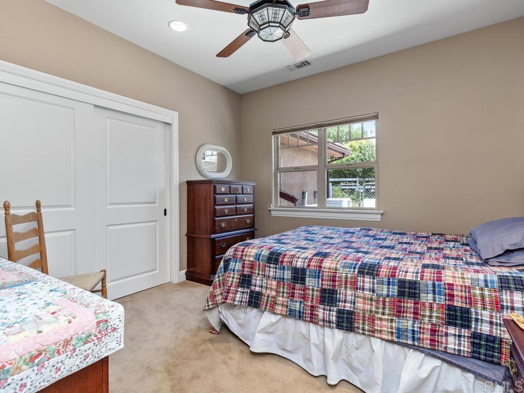 1845 Acacia Lane Fallbrook, CA 92028 - Photo 27 of 54 a bedroom with a bed and window