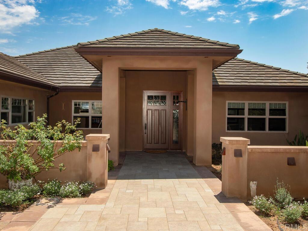 1845 Acacia Lane Fallbrook, CA 92028 - Photo 3 of 54 a front view of a house with a porch
