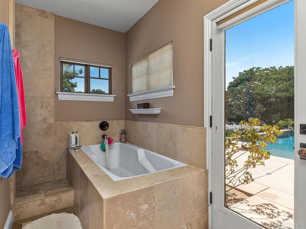 1845 Acacia Lane Fallbrook, CA 92028 - Photo 32 of 54 a bathroom with a sink and a mirror