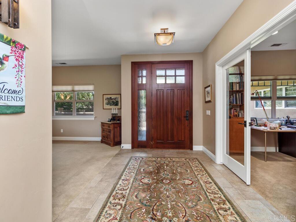 1845 Acacia Lane Fallbrook, CA 92028 - Photo 4 of 54 a view of hallway with furniture and a window
