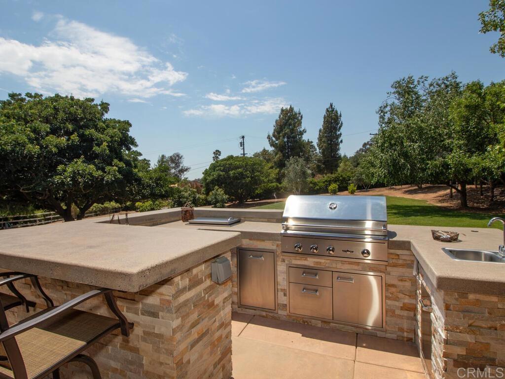 1845 Acacia Lane Fallbrook, CA 92028 - Photo 41 of 54 a view of a kitchen with a stove and a dishwasher