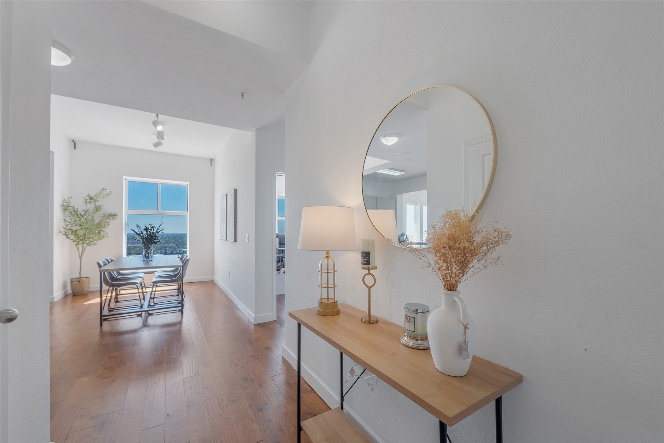 3505 Sage Road, Unit 2210 Houston, TX 77056 - Photo 40 of 40 The entryway leads you to the dining, kitchen, and living areas, with a well-designed split layout—one bedroom to the right and the primary suite on the opposite side—offering a spacious and functional floor plan.