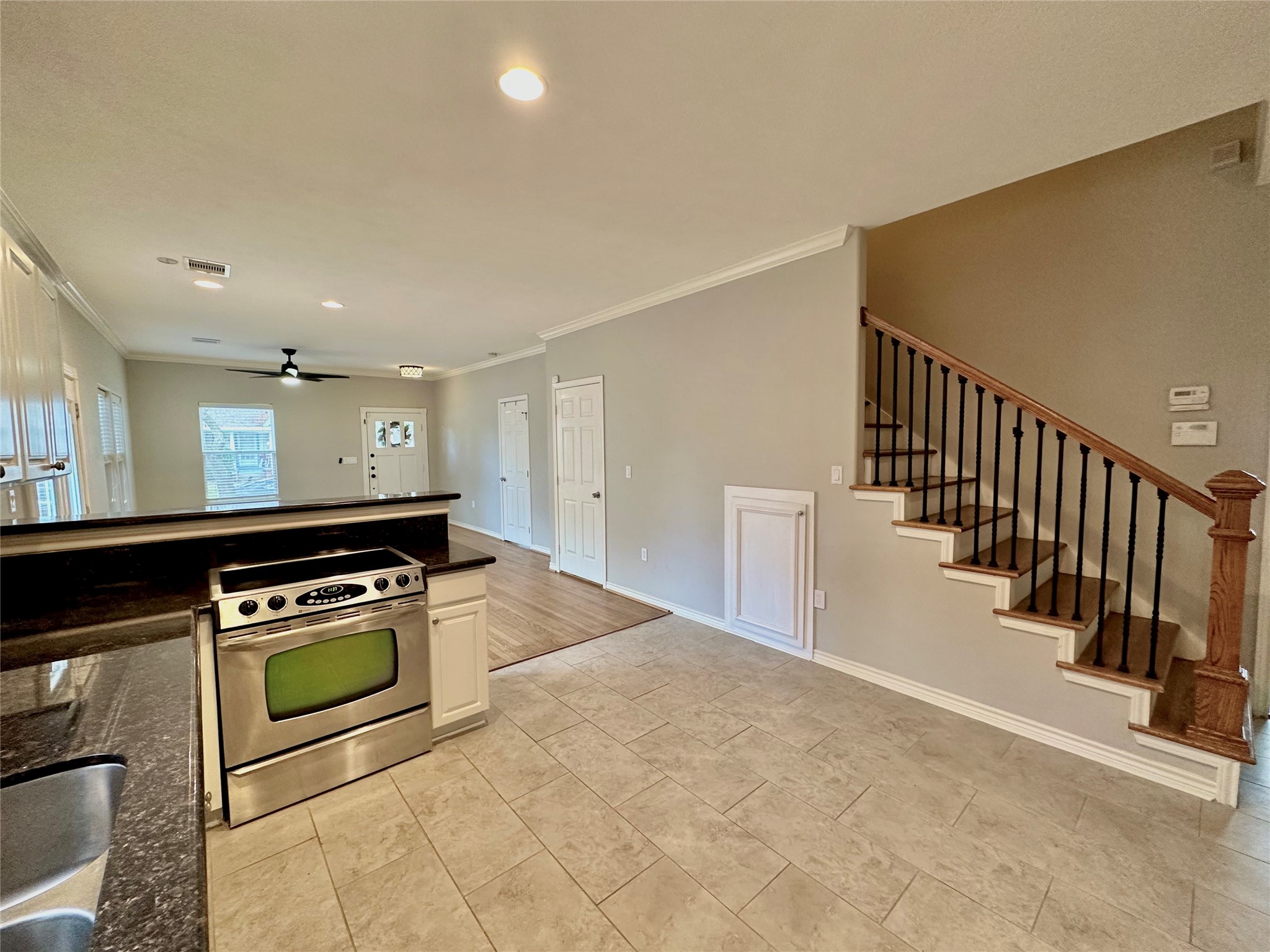 112 Munford Street Houston, TX 77008 - Photo 7 of 28 a kitchen with stove and cabinets