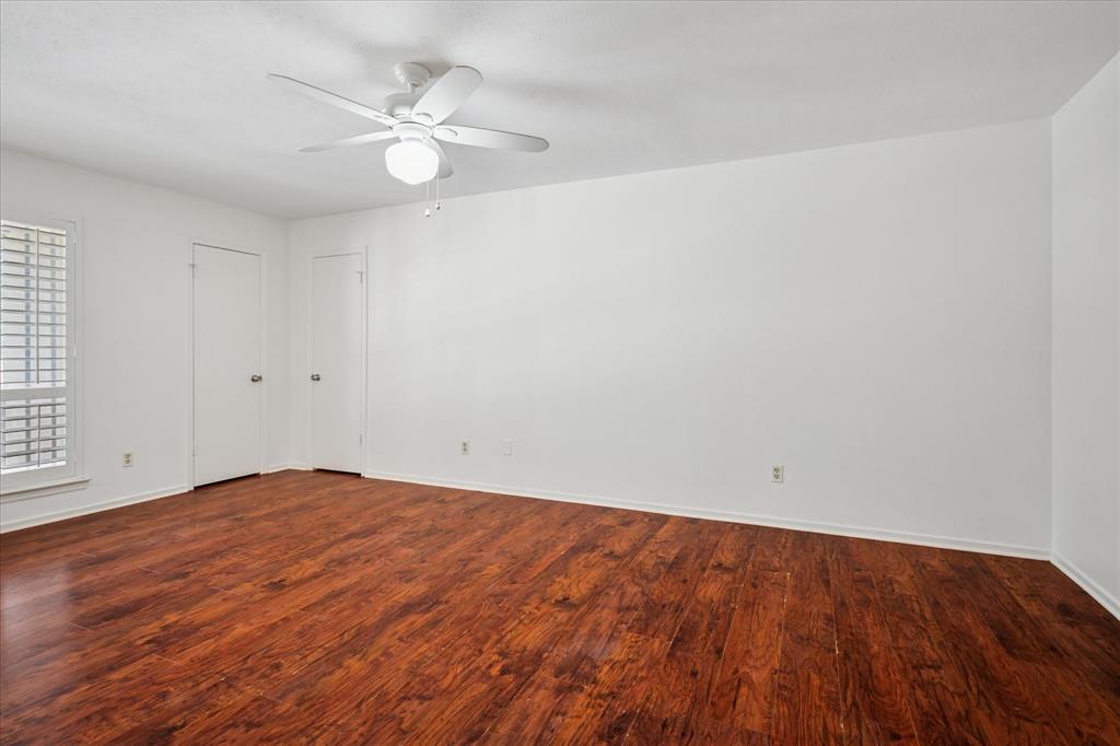 11400 Park Central Place, Unit C Dallas, TX 75230 - Photo 8 of 20 wooden floor in an empty room