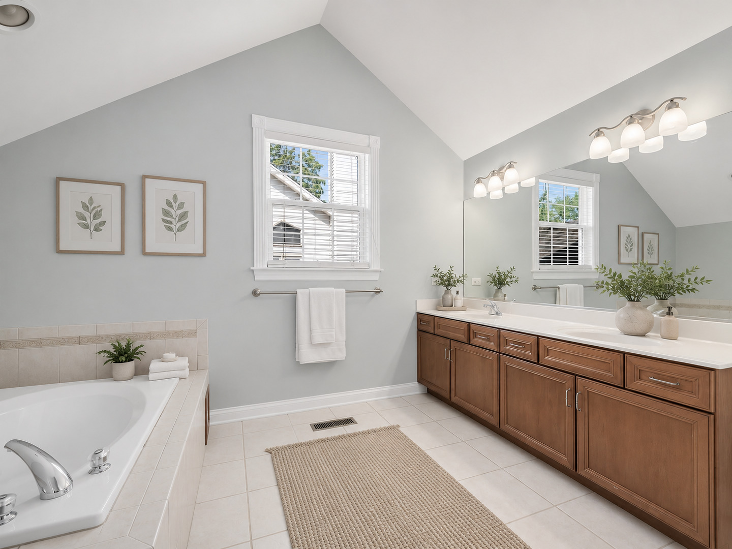 832 Bemis Road Glen Ellyn, IL 60137 - Photo 32 of 62 a spacious bathroom with a tub sink and mirror