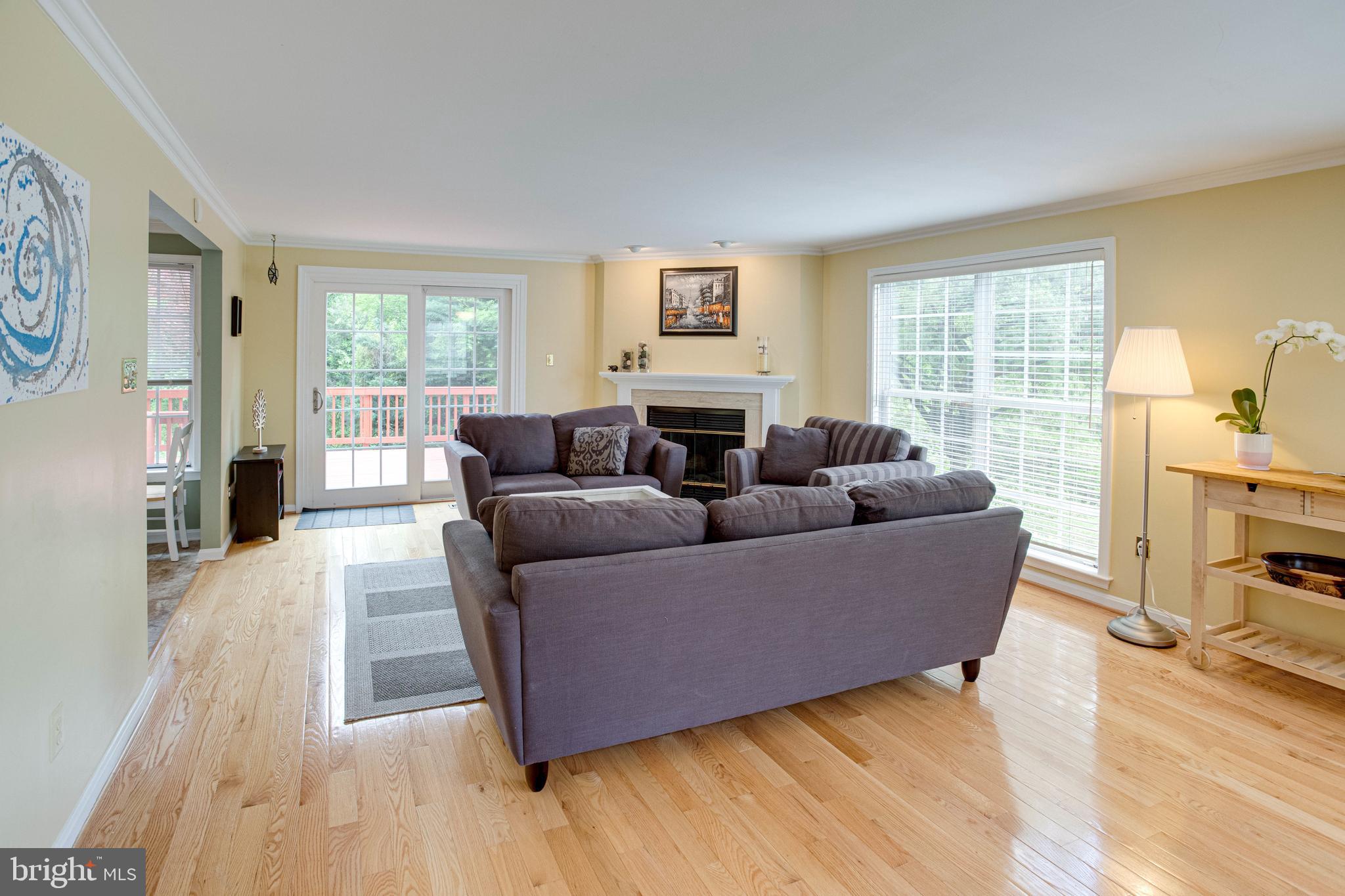 1542 Deer Point Way Reston, VA 20194 - Photo 11 of 68 Living Room with Gleaming Hardwood Floors