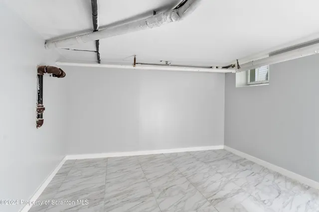 a view of a forest with a mountain