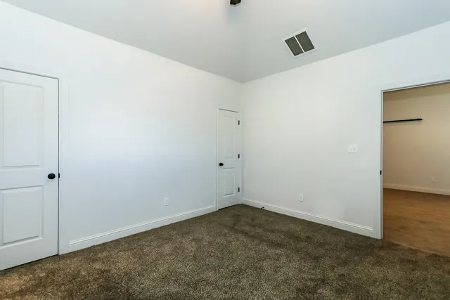 an empty room with closet