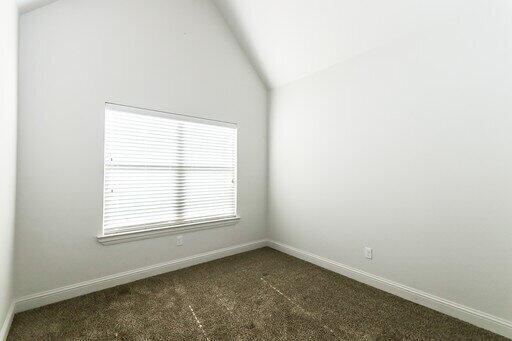 2510 112th Street, Unit B Lubbock, TX 79423 - Photo 9 of 28 an empty room with a window