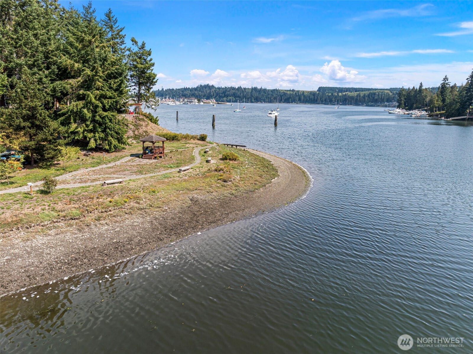 150 Ebb Tide Court Port Ludlow, WA 98365 - Photo 13 of 15 a view of a swimming pool with an ocean view