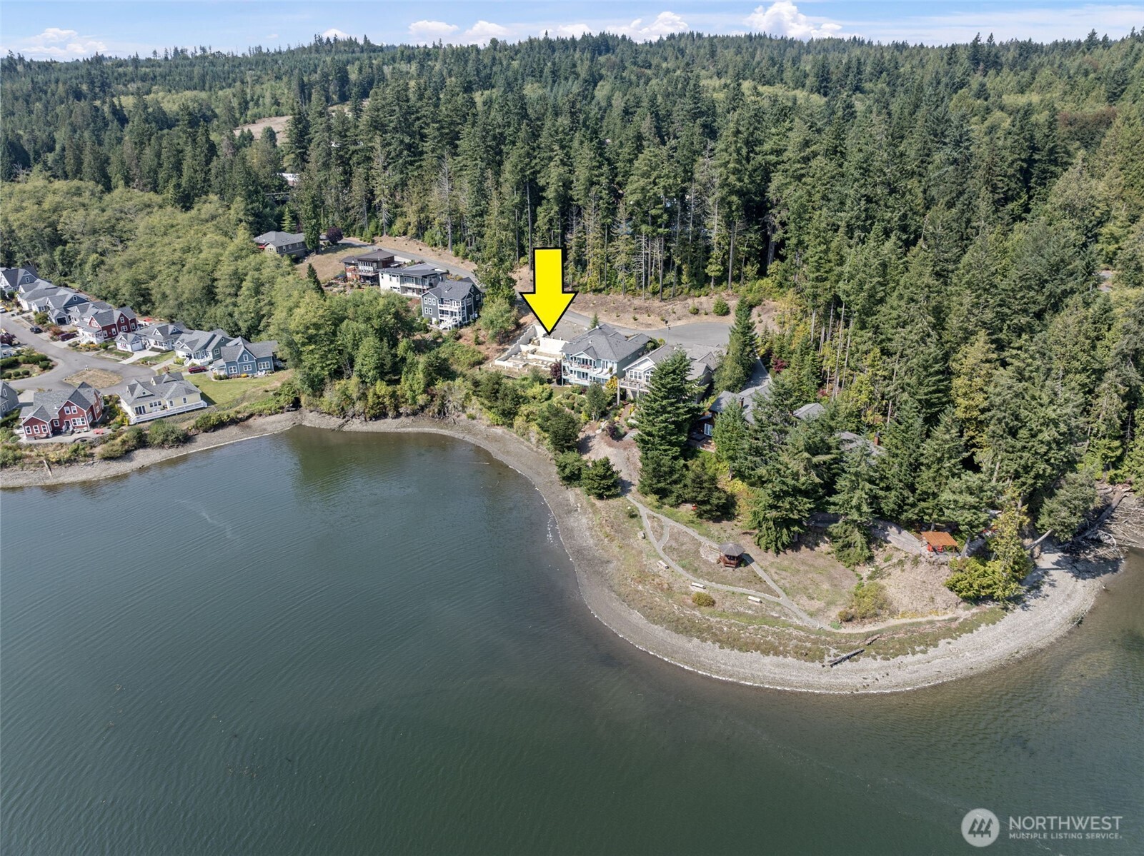150 Ebb Tide Court Port Ludlow, WA 98365 - Photo 2 of 15 a view of a lake with a yard