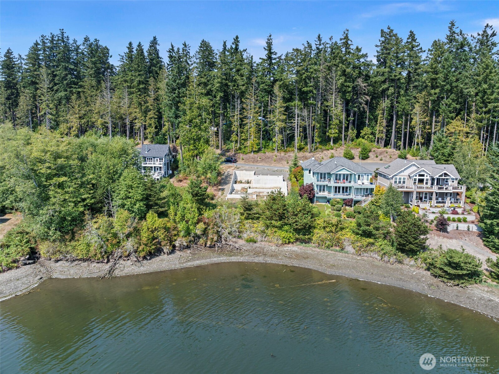 150 Ebb Tide Court Port Ludlow, WA 98365 - Photo 5 of 15 a view of a street with a building in the background