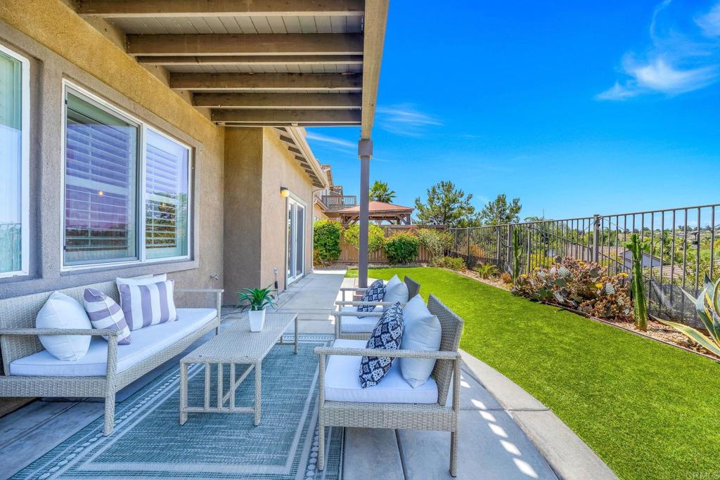 1412 Long View Drive Chula Vista, CA 91915 - Photo 29 of 45 a view of a patio with couches potted plants and wooden floor