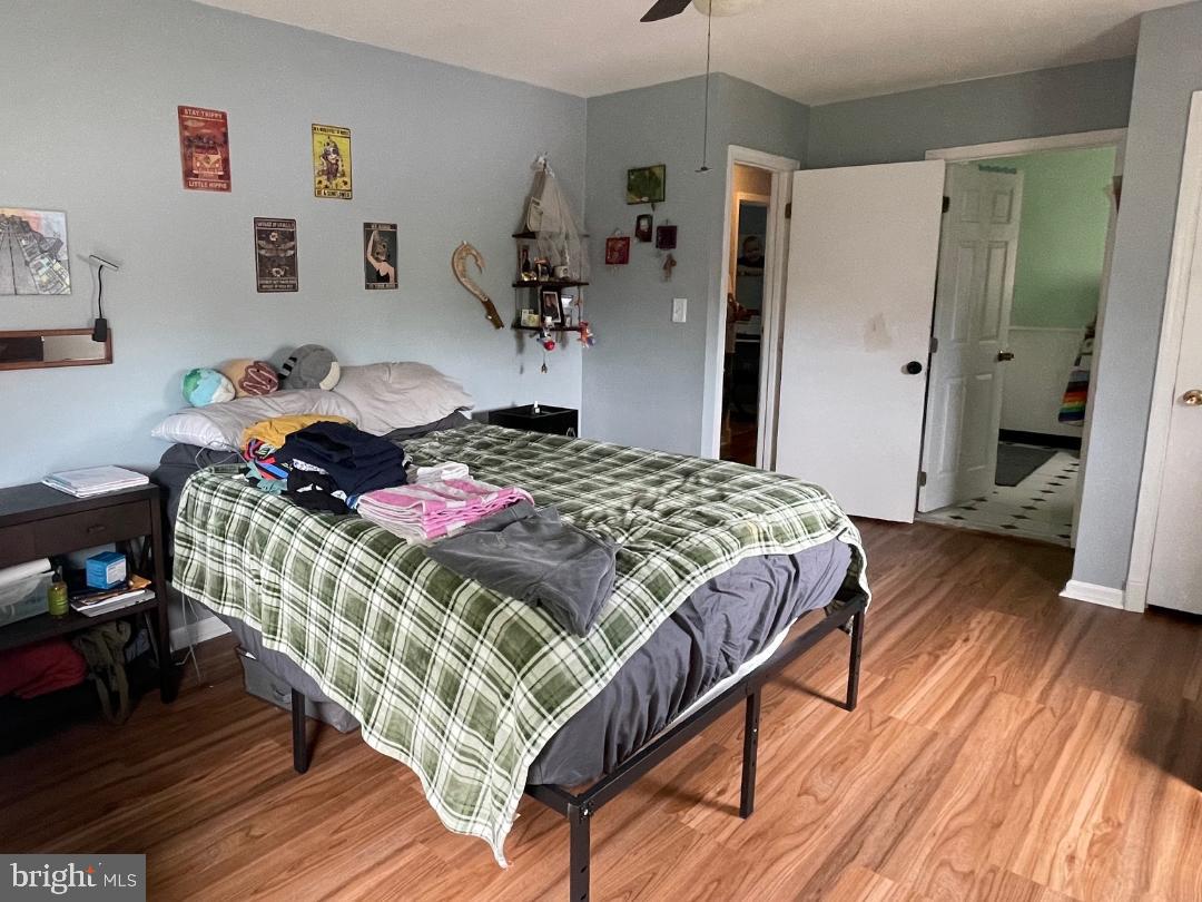 904-906 Main Avenue Croydon, PA 19021 - Photo 24 of 51 a bedroom with a bed and wooden floor