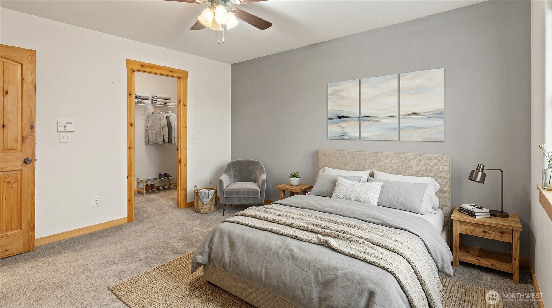 231 Clearwater Loop, Unit 1 Ronald, WA 98940 - Photo 11 of 34 a bedroom with a bed and a chandelier