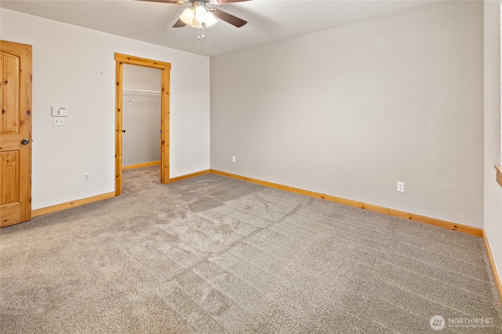 231 Clearwater Loop, Unit 1 Ronald, WA 98940 - Photo 12 of 34 an empty room with a ceiling fan and a window
