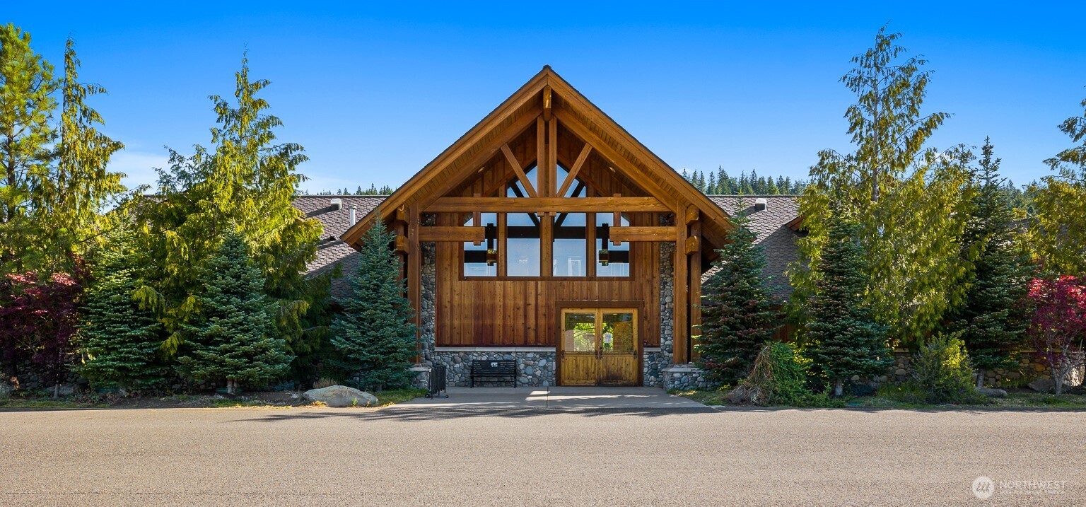 231 Clearwater Loop, Unit 1 Ronald, WA 98940 - Photo 30 of 34 a front view of a house with a yard