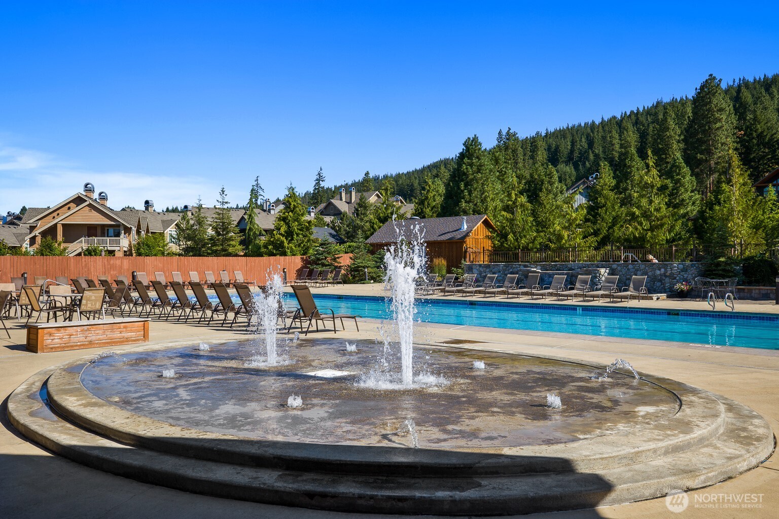 231 Clearwater Loop, Unit 1 Ronald, WA 98940 - Photo 31 of 34 a view of a swimming pool with an outdoor seating