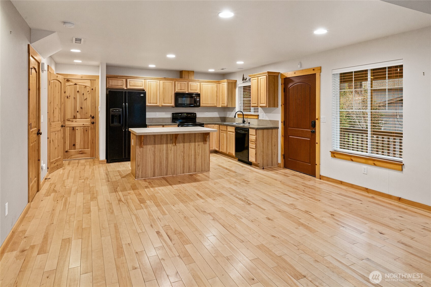 231 Clearwater Loop, Unit 1 Ronald, WA 98940 - Photo 7 of 34 a view of kitchen with stainless steel appliances kitchen island wooden cabinets and refrigerator