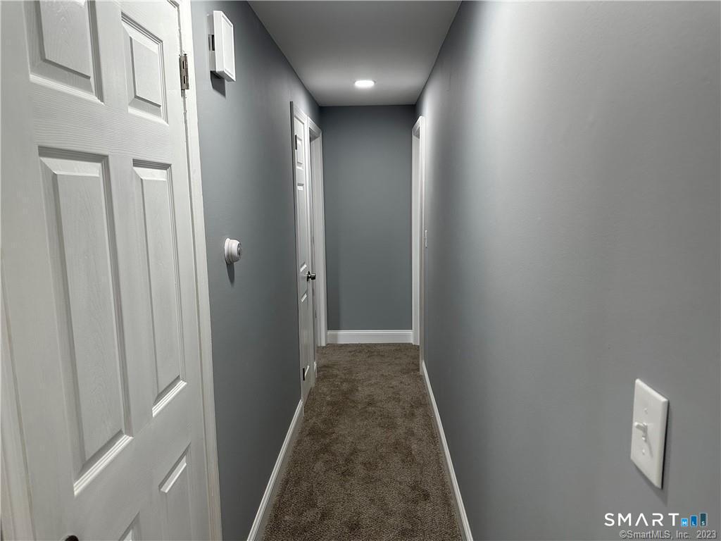 12 Brewster Road, Unit C Glastonbury, CT 06033 - Photo 6 of 10 a view of a hallway