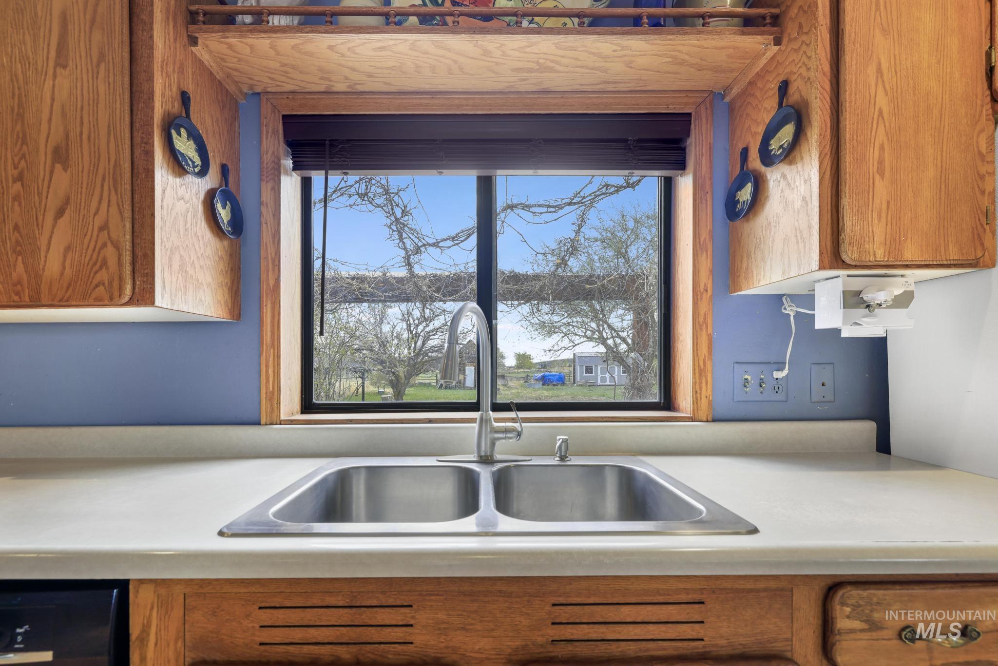 19591 Queen Crown Road Carey, ID 83320 - Photo 10 of 37 Kitchen window overlooking an expansive outdoor area