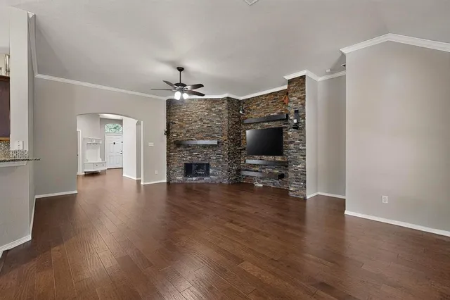 a view of livingroom with furniture flat screen tv and window