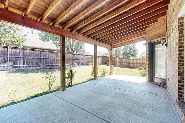 a view of a swimming pool with a porch