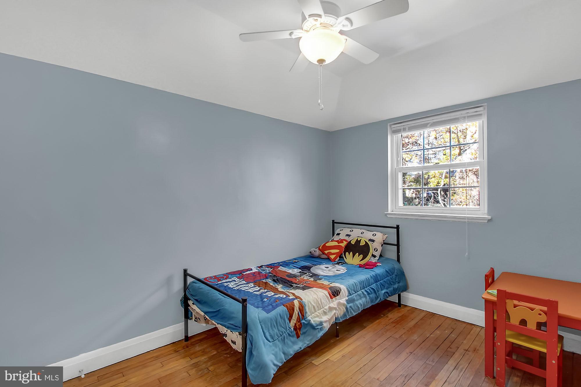 1656 Mussula Road Towson, MD 21286 - Photo 23 of 26 Hardwood floors and ceiling fan in 2nd bedroom.