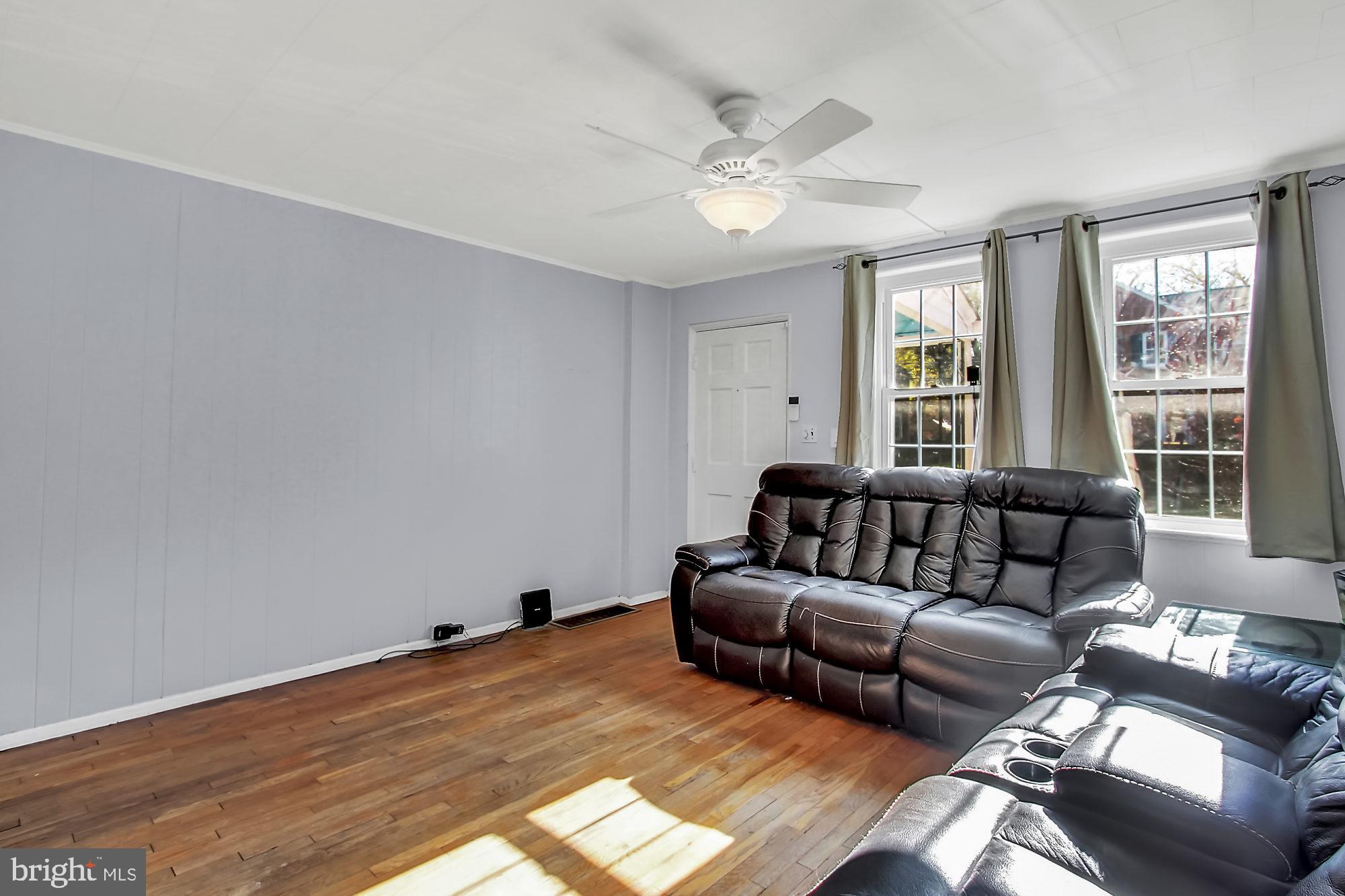 1656 Mussula Road Towson, MD 21286 - Photo 8 of 26 Hardwood floors and ceiling fan