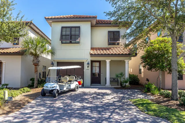 a view of a house with sitting area and furniture