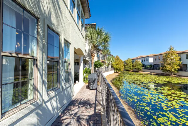 a bedroom with bed and wooden floor