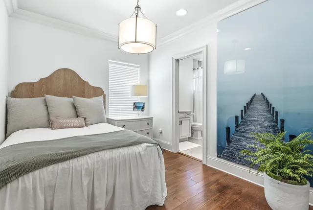 an aerial view of residential houses with outdoor space and swimming pool