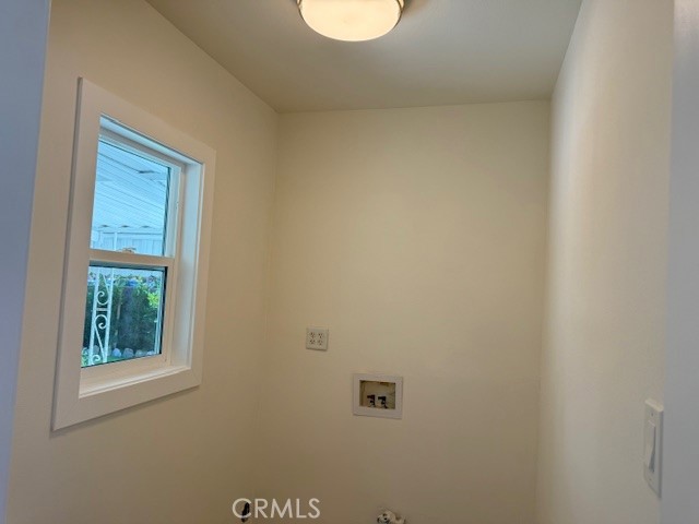 7964 Comolette Street Downey, CA 90242 - Photo 11 of 22 a bathroom with a window