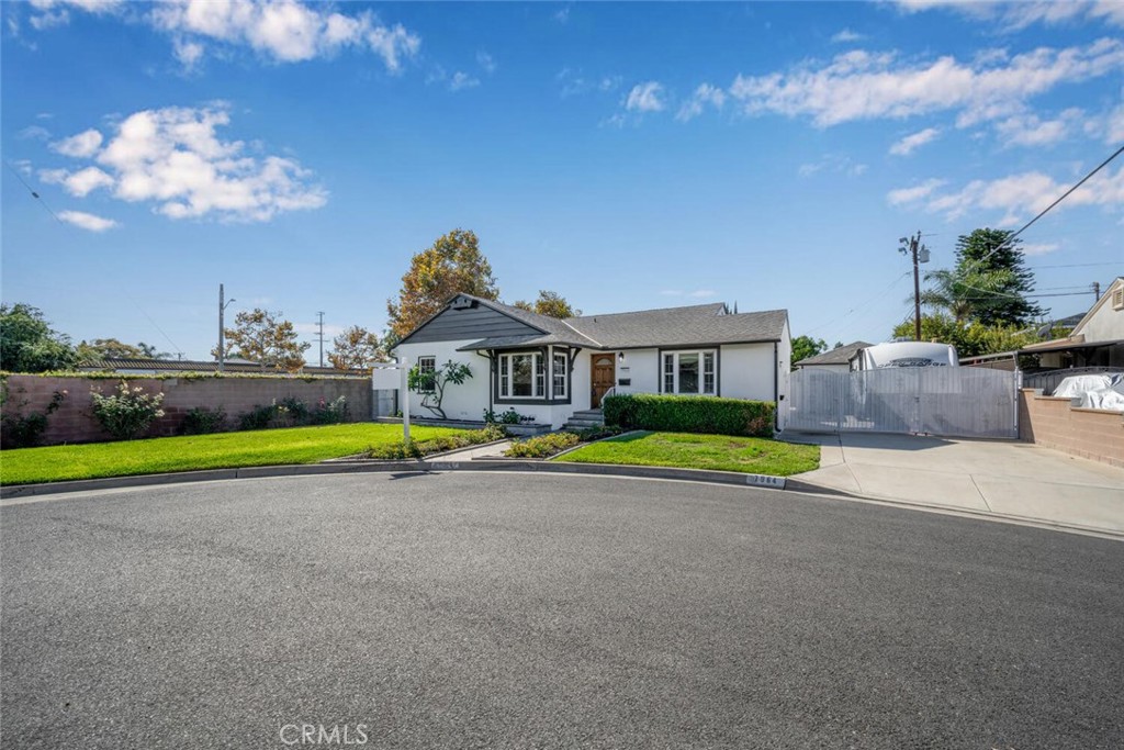 7964 Comolette Street Downey, CA 90242 - Photo 16 of 22 a view of pool with brick house in the background