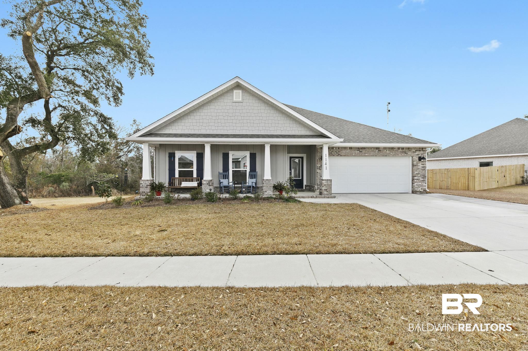 1141 Pencarro Boulevard Foley, AL 36535 - Photo 50 of 70 Craftsman inspired home featuring a garage, a front yard, and covered porch