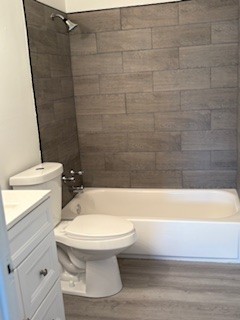 22 A Kingery Quarter, Unit 202 Willowbrook, IL 60527 - Photo 12 of 14 a bathroom with a toilet and a bathtub