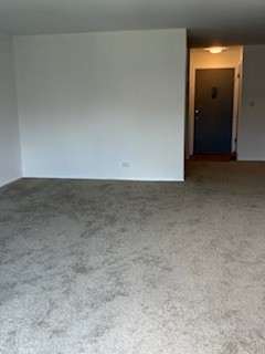 22 A Kingery Quarter, Unit 202 Willowbrook, IL 60527 - Photo 4 of 14 a view of an empty room and closet