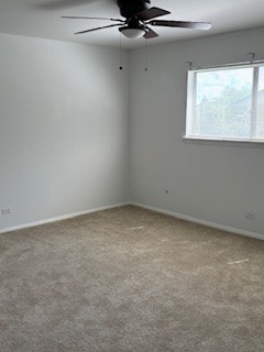 22 A Kingery Quarter, Unit 202 Willowbrook, IL 60527 - Photo 10 of 14 an empty room with a window