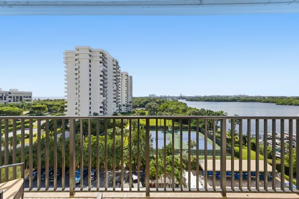 a view of a balcony with lake view