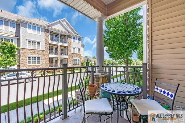 a view of a chairs on the roof deck