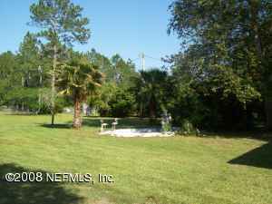 15782 Parete Road Jacksonville, FL 32218 - Photo 3 of 4 Fish Pond & Landscaping