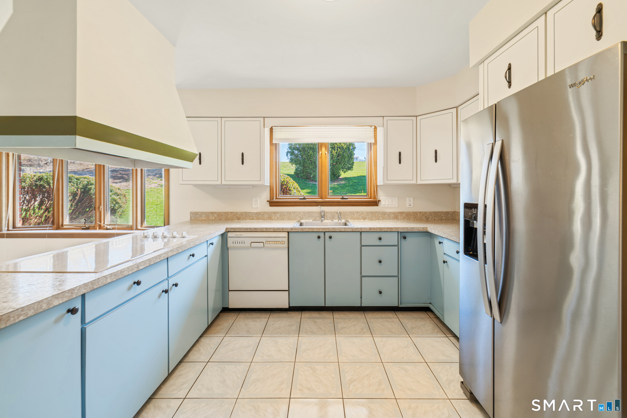 131 Sentinel Hill Road Derby, CT 06418 - Photo 6 of 40 a kitchen with a refrigerator sink and cabinets