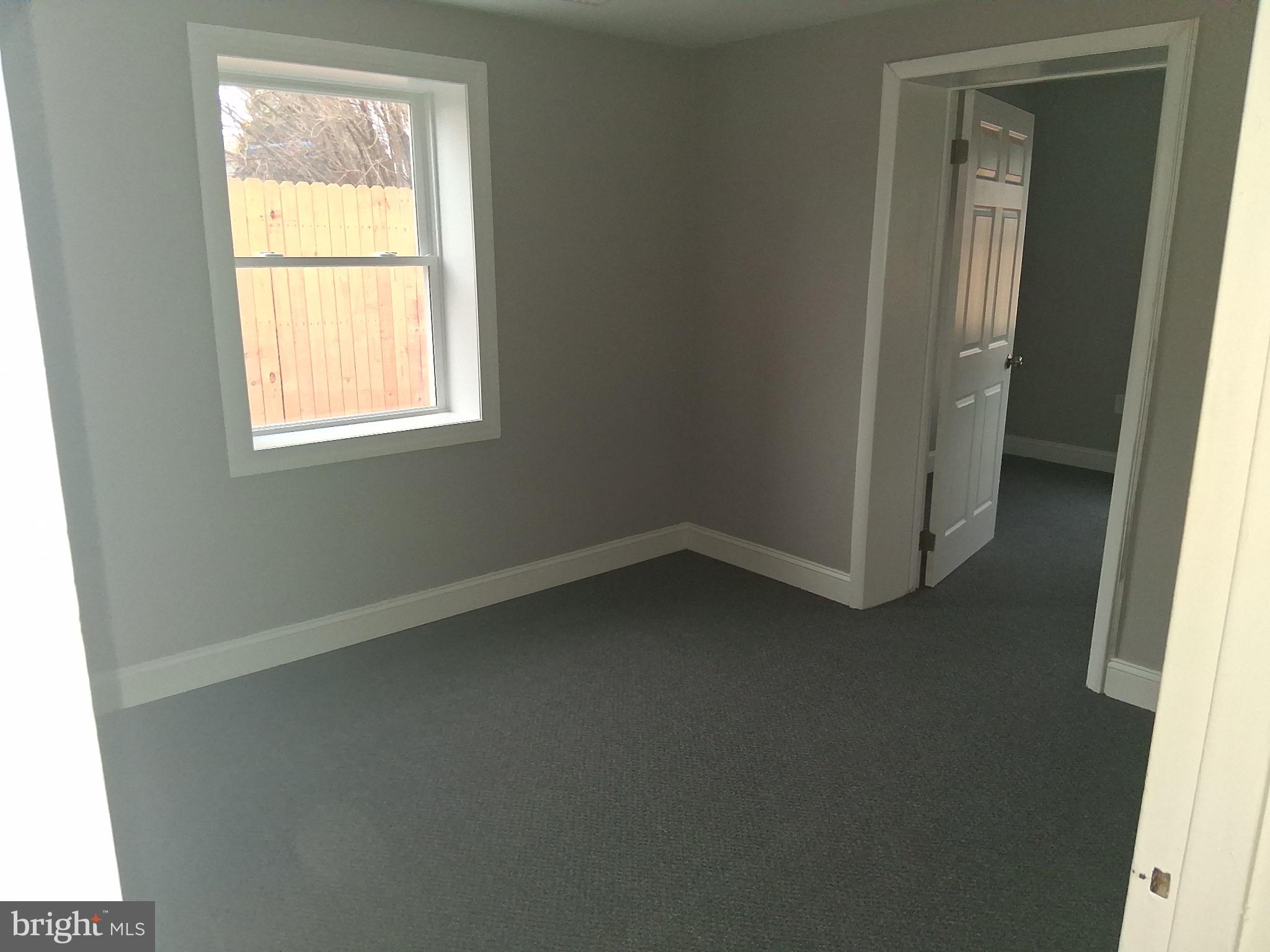 7 May Avenue New Castle, DE 19720 - Photo 12 of 21 an empty room with a window