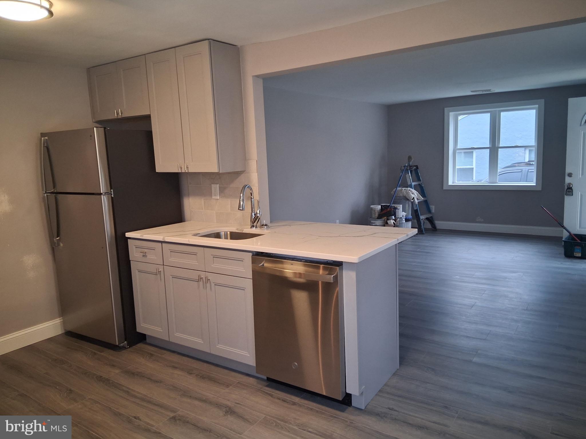 7 May Avenue New Castle, DE 19720 - Photo 7 of 21 a kitchen with a sink appliances and cabinets