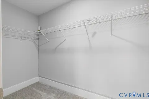a view of a room with racks on the wall
