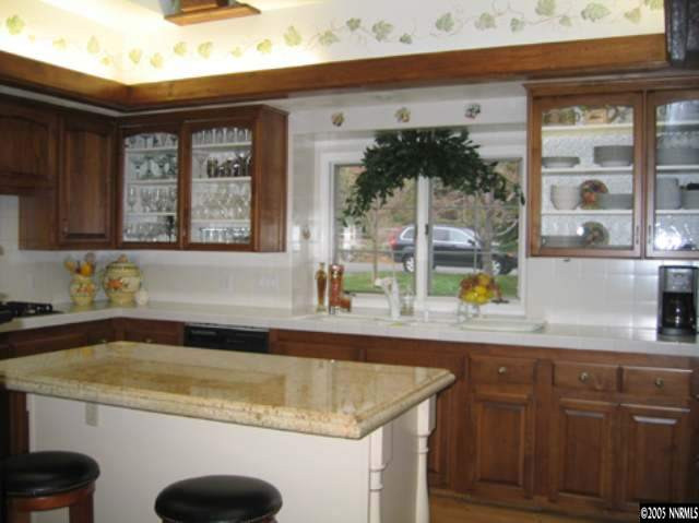 4140 Plateau Road Reno, NV 89519 - Photo 3 of 9 a kitchen with a sink and cabinets